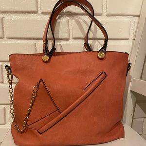 Pink purse with attached wallet